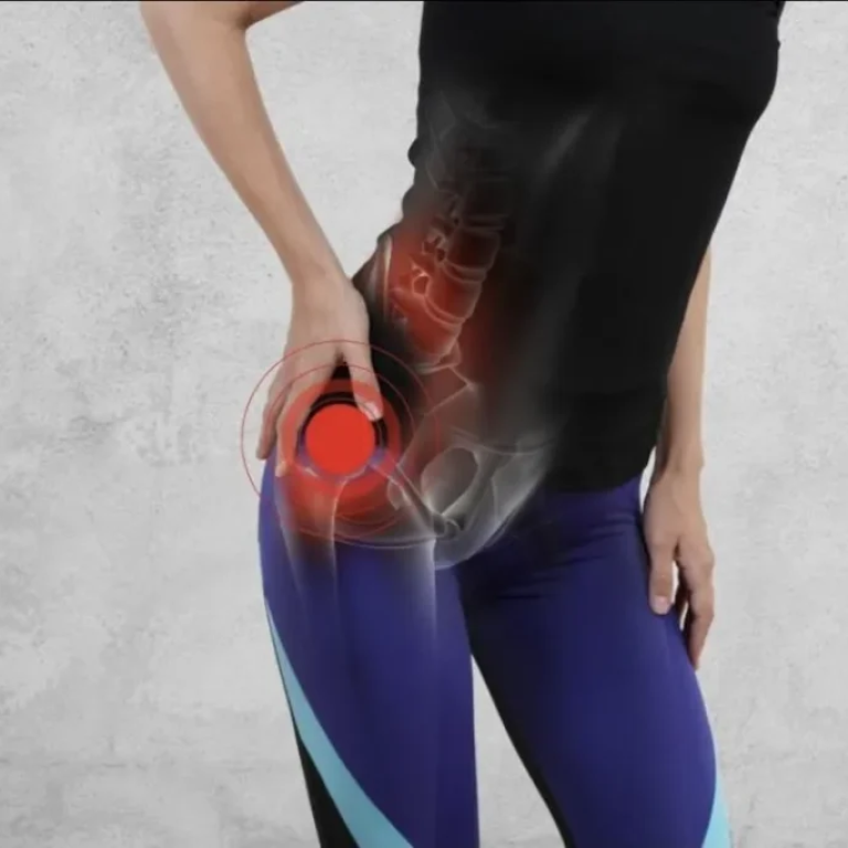 Woman holding her hip with a red pain highlight showing burning pain in hip near the hip joint.